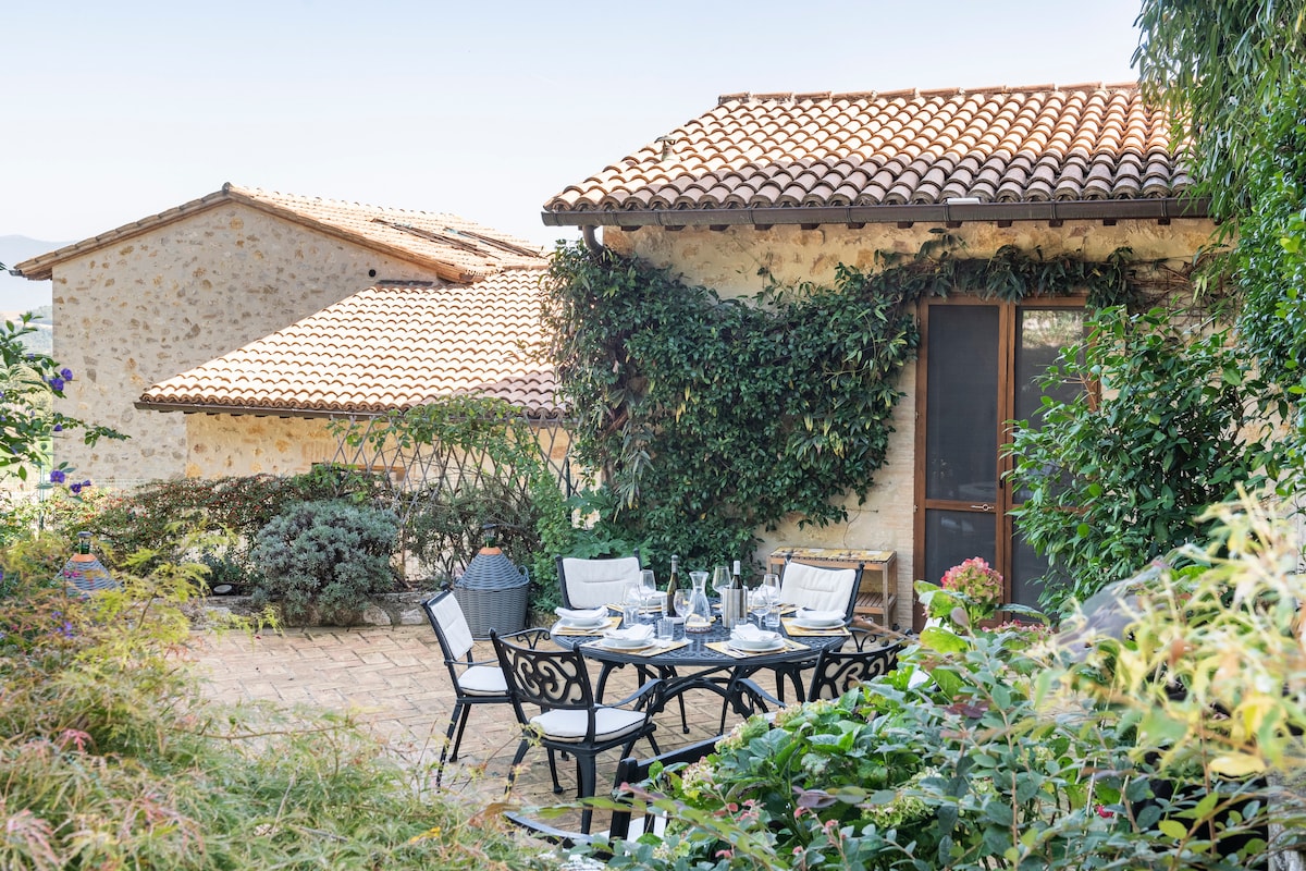 Outdoor dining on the terrace with countryside views
